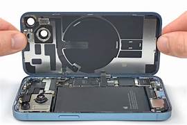 Image of a technician repairing an iPhone